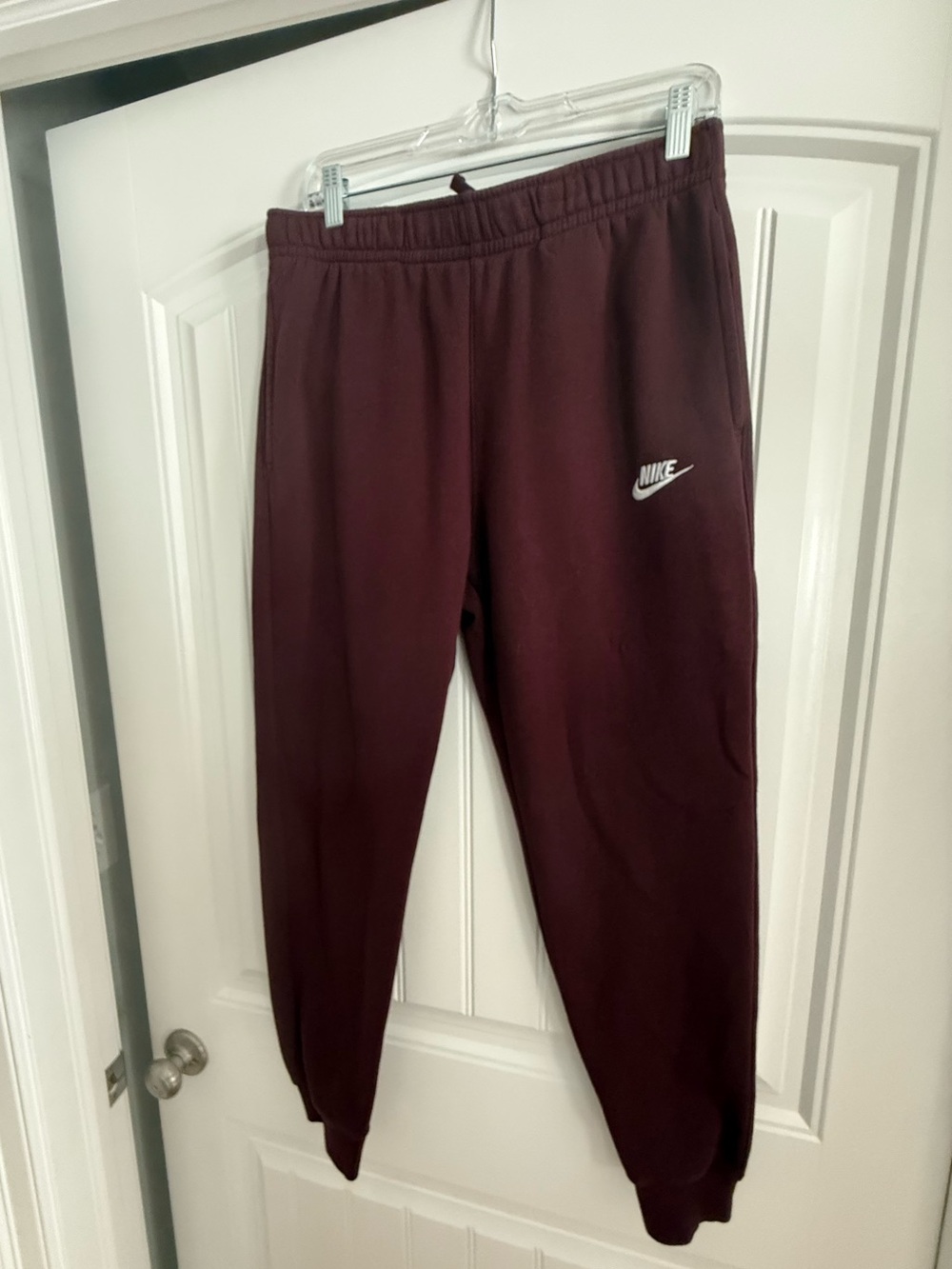 Nike Burgundy Sweatpants with White Swoosh Tag